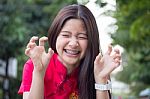 Portrait Of Thai Teen Beautiful Girl In Chinese Dress, Relax And Smile Stock Photo