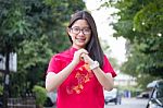 Portrait Of Thai Teen Beautiful Girl In Chinese Dress, Relax And Smile Stock Photo