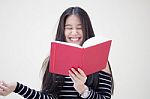 Portrait Of Thai Teen Beautiful Girl Reading Book Stock Photo