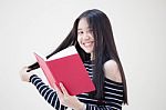 Portrait Of Thai Teen Beautiful Girl Reading Book Stock Photo