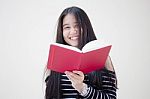 Portrait Of Thai Teen Beautiful Girl Reading Book Stock Photo