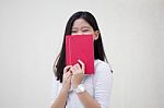 Portrait Of Thai Teen Beautiful Girl Reading Book Stock Photo