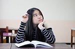 Portrait Of Thai Teen Beautiful Girl Writing Book Stock Photo