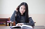 Portrait Of Thai Teen Beautiful Girl Writing Book Stock Photo