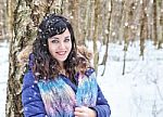 Portrait Of Young Beautiful Woman Walking In The Woods Stock Photo