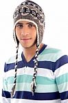 Portrait Of Young Boy Covering His Head With Woolen Cap Stock Photo