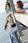 Portrait Of Young Couple Looking At The Horizon Stock Photo