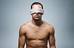 Portrait Of Young Naked Blindfold Man Stock Photo