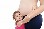 Pregnant Woman With Her Daughter Stock Photo