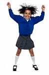 Pretty African School Girl Dances In Full Swing Stock Photo