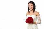 Pretty Bride Posing With Love Red Roses Bouquet Stock Photo