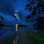 Pretty Brunette Model In Beach Dress Posing At The Pool Stock Photo