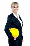 Pretty Business Architect With Yellow Safety Helmet In Hand Stock Photo