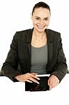 Pretty Businesswoman Using Tablet Device Stock Photo