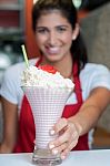 Pretty Girl Serving Strawberry Shake Stock Photo