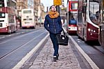 Pretty Girl Walking On The Road Stock Photo