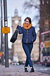 Pretty Girl Walking On The Road Stock Photo