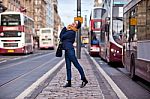 Pretty Girl Walking On The Road Stock Photo