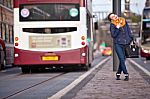 Pretty Girl Walking On The Road Stock Photo