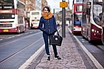 Pretty Girl Walking On The Road Stock Photo