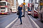 Pretty Girl Walking On The Road Stock Photo