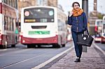 Pretty Girl Walking On The Road Stock Photo