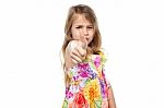 Pretty Kid Showing Thumbs Up Stock Photo