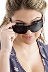 Pretty Model Holding Sunglasses Stock Photo