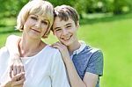 Pretty Mother With Her Charming Son Stock Photo