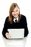 Pretty Schoolgirl Holding Newly Launched Tablet Pc Stock Photo