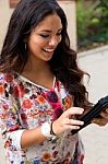 Pretty Student Girl Surfing The Internet Stock Photo