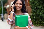 Pretty Student Girl Talking On The Phone Stock Photo