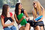 Pretty Student Girls Having Fun At The Campus Stock Photo