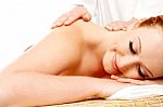 Pretty Woman Getting Massage In A Spa Center Stock Photo