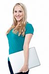 Pretty Woman Posing With Laptop Stock Photo