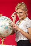 Pretty Woman Teacher With Globe Stock Photo