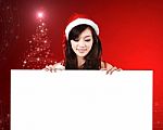 Pretty Women In Santa Outfit Stock Photo