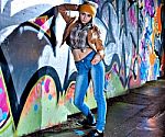 Pretty Young Girl And Graffiti Stock Photo