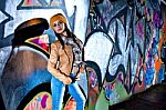 Pretty Young Girl And Graffiti Stock Photo