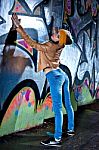 Pretty Young Girl And Graffiti Stock Photo