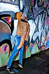 Pretty Young Girl And Graffiti Stock Photo