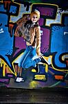 Pretty Young Girl And Graffiti Stock Photo