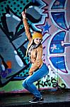 Pretty Young Girl And Graffiti Stock Photo