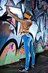 Pretty Young Girl And Graffiti Stock Photo