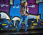 Pretty Young Girl And Graffiti Stock Photo