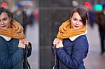 Pretty Young Girl Standing At Shopfront Stock Photo