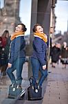 Pretty Young Girl Standing At Shopfront Stock Photo