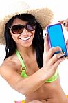 Pretty Young Girl With Green Bikini Taking Selfies With Her Smar Stock Photo