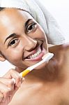 Pretty Young Woman Brushing Her Teeth Stock Photo