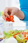 Pretty Young Woman Cooking At Home Stock Photo